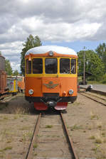 The diesel multiple unit YBO5p 888 on narrow gauge at the railway station in Virserum.