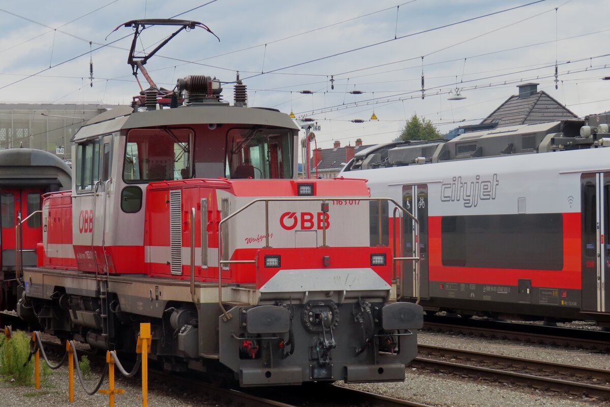 ÖBB 1163 017 waits at Villach Hbf on new tasks on 15 September 2024.