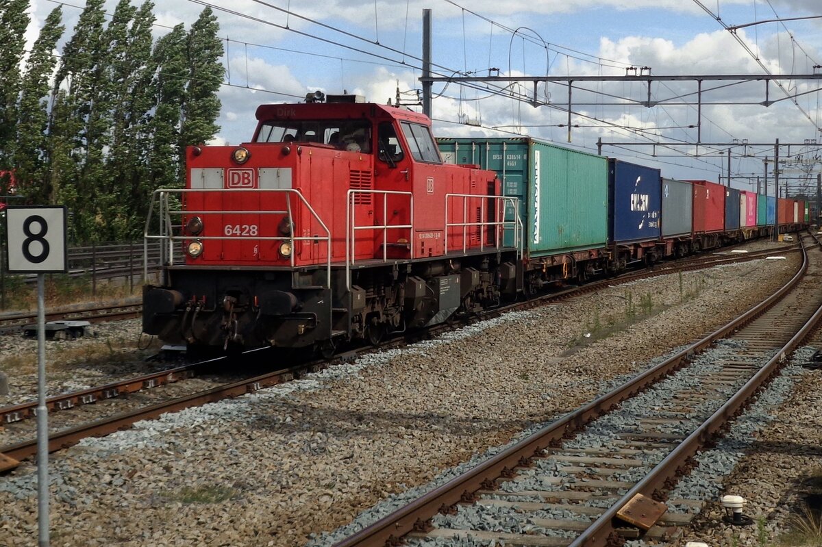 On 24 July 2018 a container train headed by 6428 is about to pass Breda.
