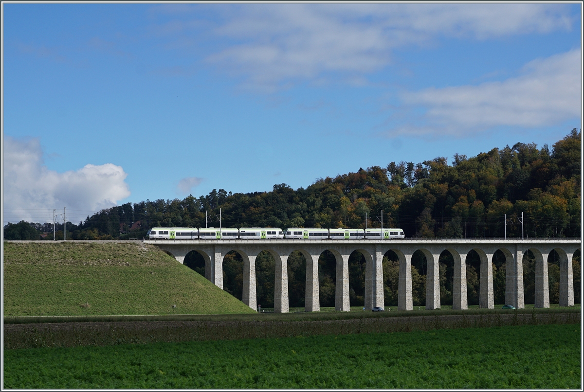 The 393 meter long Gümmenen Viaduct over the Saane is very impressive. Two BLS RABe 525  NINA  are traveling from Kerzers to Bern as S 5 15545.

October 5, 2024