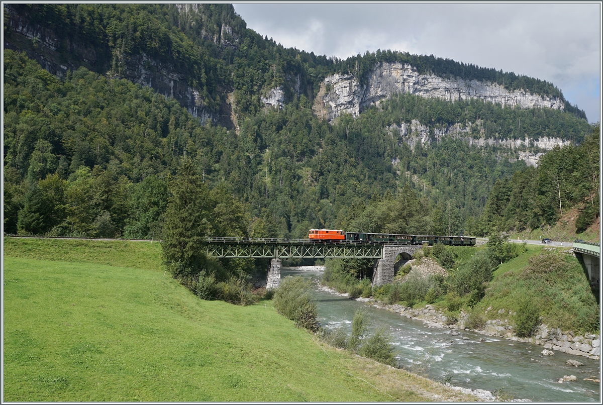 The Bregenzer Wald Bahn (ex) ÖBB 2095.13 runs its morning train from Schwarzenberg to Bezau and, a few minutes after its departure, travels over the 68 meter long Sporenegg Bridge which leads over the Bregenzer Ach.  

September 15, 2024