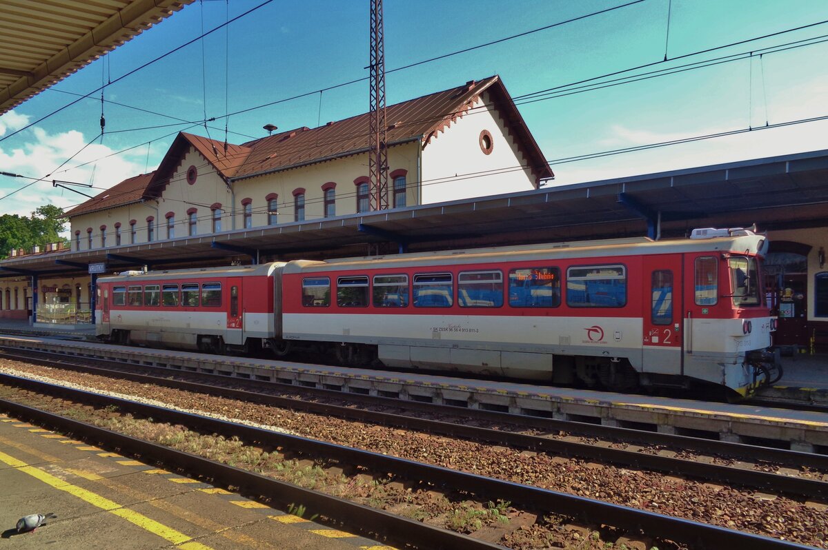 ZSSK 813/913 011 takes a Sun bath at Vrutky on 14 May 2018.