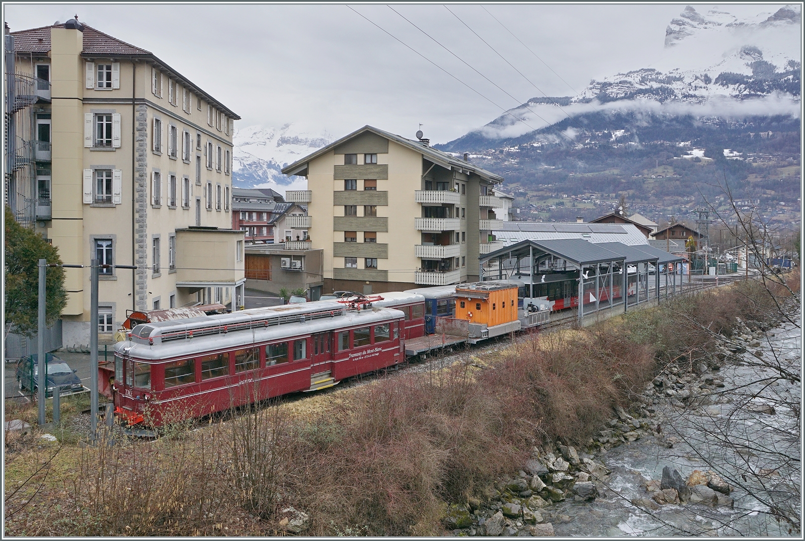 A view from the Bon Nat Bridge towards the TMB depot and workshop with various older vehicles, in particular the JEANNE railcar.

21 February 2026 