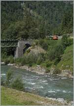 The Bregenzer Wald Bahn (ex) ÖBB 2095.13 runs its morning train from Schwarzenberg to Bezau and reaches the 68 meter long Sporenegg Bridge a few minutes after its departure.