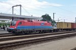 On 5 May 2016 an intermodal train with 1116 011 at the helms passes through Kelenföld.