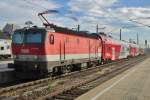 ÖBB 1144 109 pushes an regional train out of Wien-Meidling on 16 September 2015.