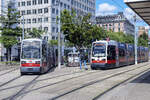 Tram B777 and B614 at Schottenring Station in Vienna. Date: 19 May 2024.