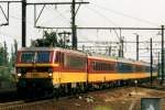 On 13 June 2006 NMBS 1186 speeds through Antwerpen Berchem.

