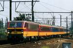 On 16 May 2002 NMBS 1186 with IC-Benelux is about to call at Antwerpen-Berchem. 
