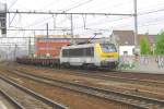 NMBS 1303 passes through Antwerpen Berchem on 23 February 2012.