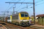 NMBS 1313 passes through Antwerpen Noorderdokken on 3 March 2011.