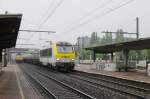 NMBS 1320 enters the Antwerp harbour area and passes on 30 May 2013 Antwerpen-Noorderdokken.