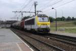 NMBS 1313 leaves Antwerpen Noorderdokken with a mixed freight on 22 August 2013.