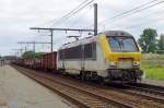 On a grey 19 June 2014 NMBS 1338 passes Antwerpen Noorderdokken.