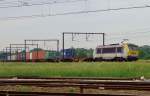 Container train with 1315 is about to pass Antwerpen-Noorderdokken on a grey 18 June 2014.