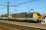 NMBS 1308 hauls a sister loco through Antwerpen-Dam on 23 March 2011.