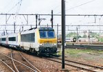 NMBS 1304 passes through Merelbeke on 16 July 2000.