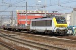 NMBS 1319 passes through Antwerpen-Berchem on 29 June 2016.