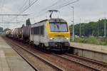 Tank train with 1302 passes through Antwerpen-Luchtbal on 12 August 2017 and gets thoroughly bombarded by the rain -as was your photographer.
