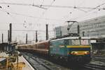 On a rainy 16 September 2004 SNCB 1601 hauls a mundane peak hour train out of Bruxelles-Midi toward Schaerbeek.