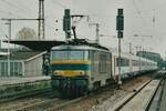 SNCB 1605 has picked up the empty stock for Int.420 Köln Hbf--Oostende and passes Köln-Deutz on 13 February 2000.