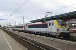 NMBS 1833 pushes an IC toward Lige and Eupen out of Gent Sint-Pieters on 22 May 2014. 