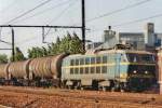 Tank train with 2009 passes Antwerpen-Dam on 16 May 2002.