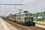 NMBS 2023 hauls a mixed freight through Antwerpen-Luchtbal on 13 April 2006.