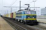 NMBS 2014 hauls a container train through Antwerpen-Luchtbal on 3 May 2013.