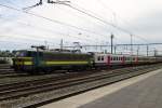 NMBS 2158 pushes an IC for Kortrijk out of Brugge on 22 May 2014.