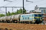 On 16 May 2002 NMBS 2325 hauls a tank train through Antwerpen-Dam.