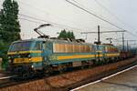 NMBS 2734 hauls a sister loco and a freight through Antwerpen-Dam on 16 May 2002.