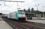 With a tank train and a dead sister in tow CoBRa 2805 speeds through Antwerpen-Noorderdokken and homes in on her destination, the Antwerp docks area, on 22 August 2013.