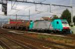 CoBRa 2831 hauls a tank train through Antwerpen-Berchem on 3 September 2015.