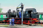 CFV3V steam locomotive 158 getting his water at the station of Mariembourg.