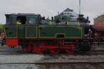 The driver of loco 22 TOM (from Tata Steel IJmuiden and based with the SCM) enjoys a brief pause at Maldegem during the steam weekend on a rainy 6 May 2023.