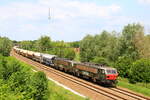 Locomotives 2707 and 2731 hauling a goods train between Roosendaal and Saint-Ghislain, are passing Hennuyères on line 96.