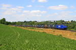 Crossrail locomotive 186 269 hauling the GTS train from Zeebrugge to Aachen-West, is passing in Wonck, 3/7/2025