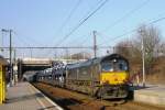 TrainsporT 653-5 (owned by MRCE) passes Antwerpen-Zuid on 23 March 2011.