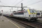 NMBS 1807 pushes an IC to Oostende out of Antwerpen-Berchem on 22 August 2013.