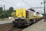 SNCB 7856 speeds through Antwerpen Noorderdokken on 29 August 2013.