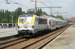 NMBS 1812 passes through Antwerpen-Noorderdokken on 29 August 2013.