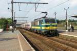 NMBS 2720 calls at Antwerpen Noorderdokken with a Peak Hour Train on 29 August 2013.

