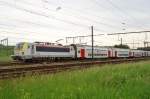 NMBS 1876 shunts herself into the sidings near Antwerpen-Noorderdokken on a grey 21 May 2014.