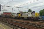 NMBS 7783 passes Antwerpen-Berchem on a grey 21 May 2014.