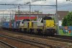 On a grey 21 May 2014, NMBS 7850 hauls a freight through Antwerpen-Berchem.