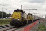 Container train, hauled by 7776, passes Antwerpen-Luchtbal on 18 June 2014.