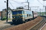 Peak Hour train with 25009 calls at Antwerpen-Dam on 16 May 2002.