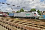 Akiem 186 184 with intermodal service passes through Antwerpen-Berchem on 29 June 2016.