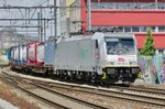 Akiem 186 184 with intermodal service passes through Antwerpen-Berchem on 29 June 2016.